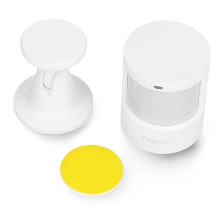 Drei Komponenten eines zerlegten Sensors liegen auf weißem Hintergrund.